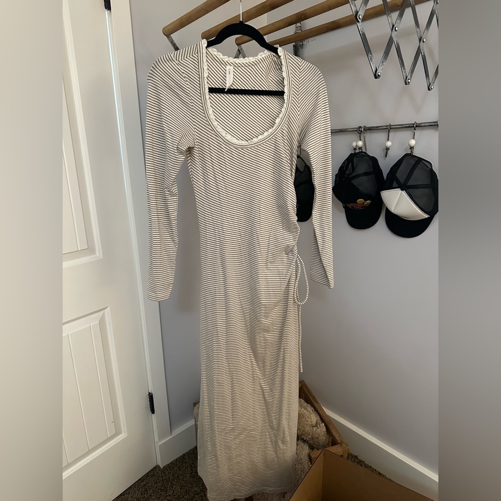 Cute cotton body skimming dress. Bought from
Anthropologie.